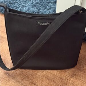 Kate Spade Black Messenger Bag with Minimalist Design